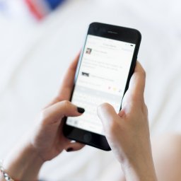 Close up of hands on phone